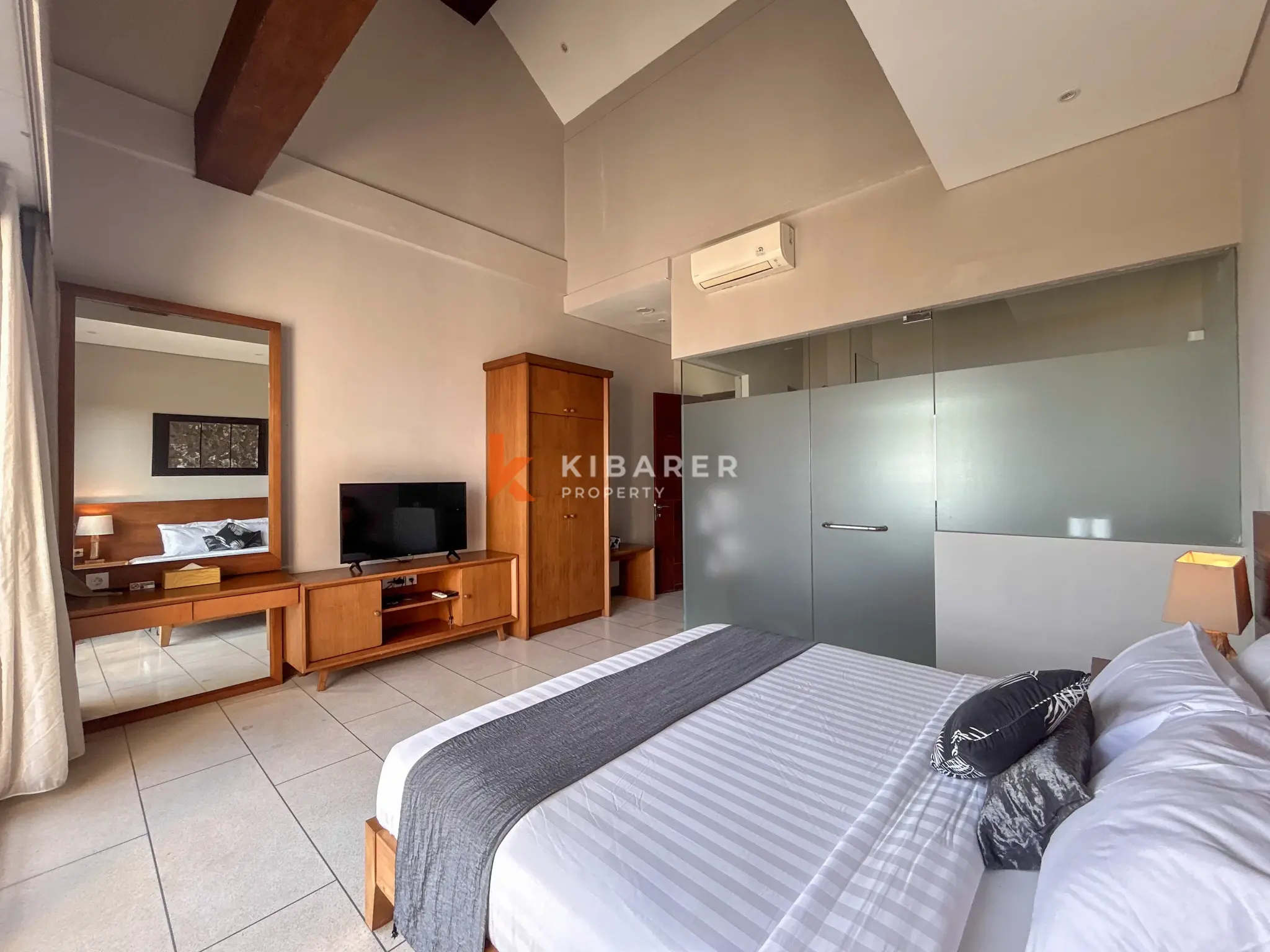 Modern Three-Bedroom Villa with Pool and Scenic Balcony Views in Nusa Dua
