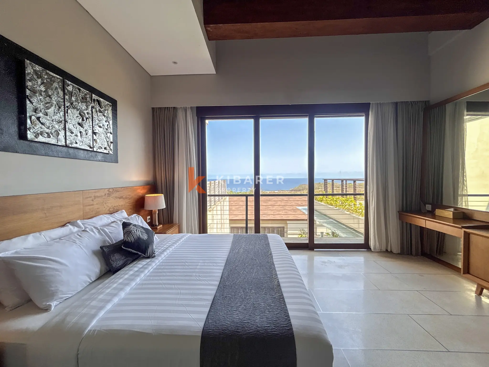 Modern Three-Bedroom Villa with Pool and Scenic Balcony Views in Nusa Dua