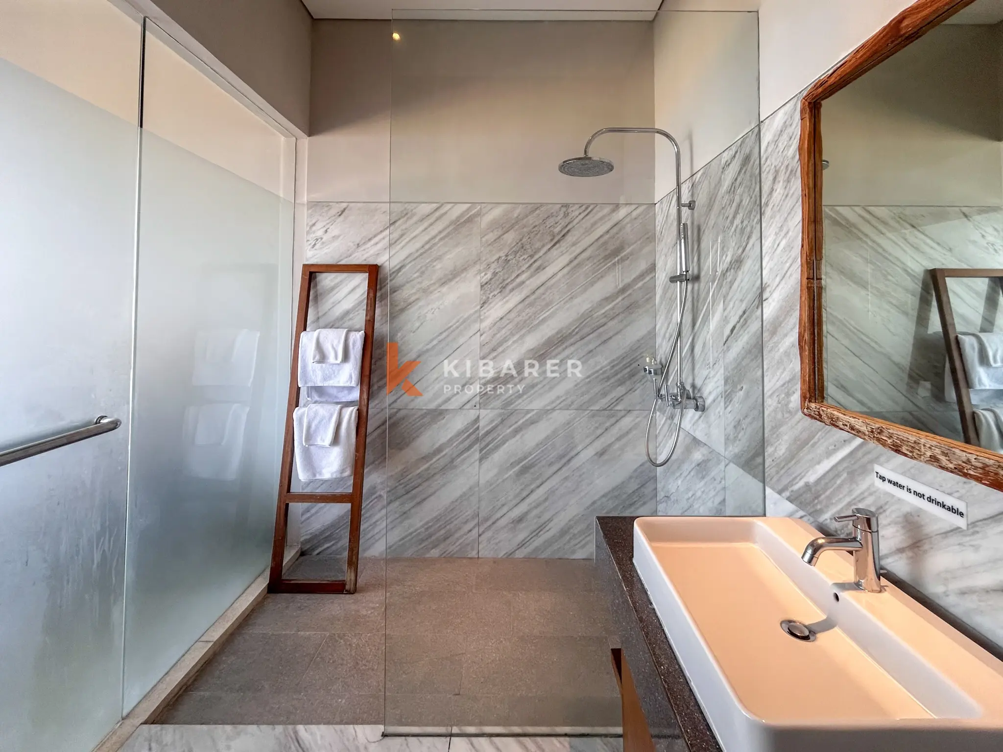 Modern Three-Bedroom Villa with Pool and Scenic Balcony Views in Nusa Dua