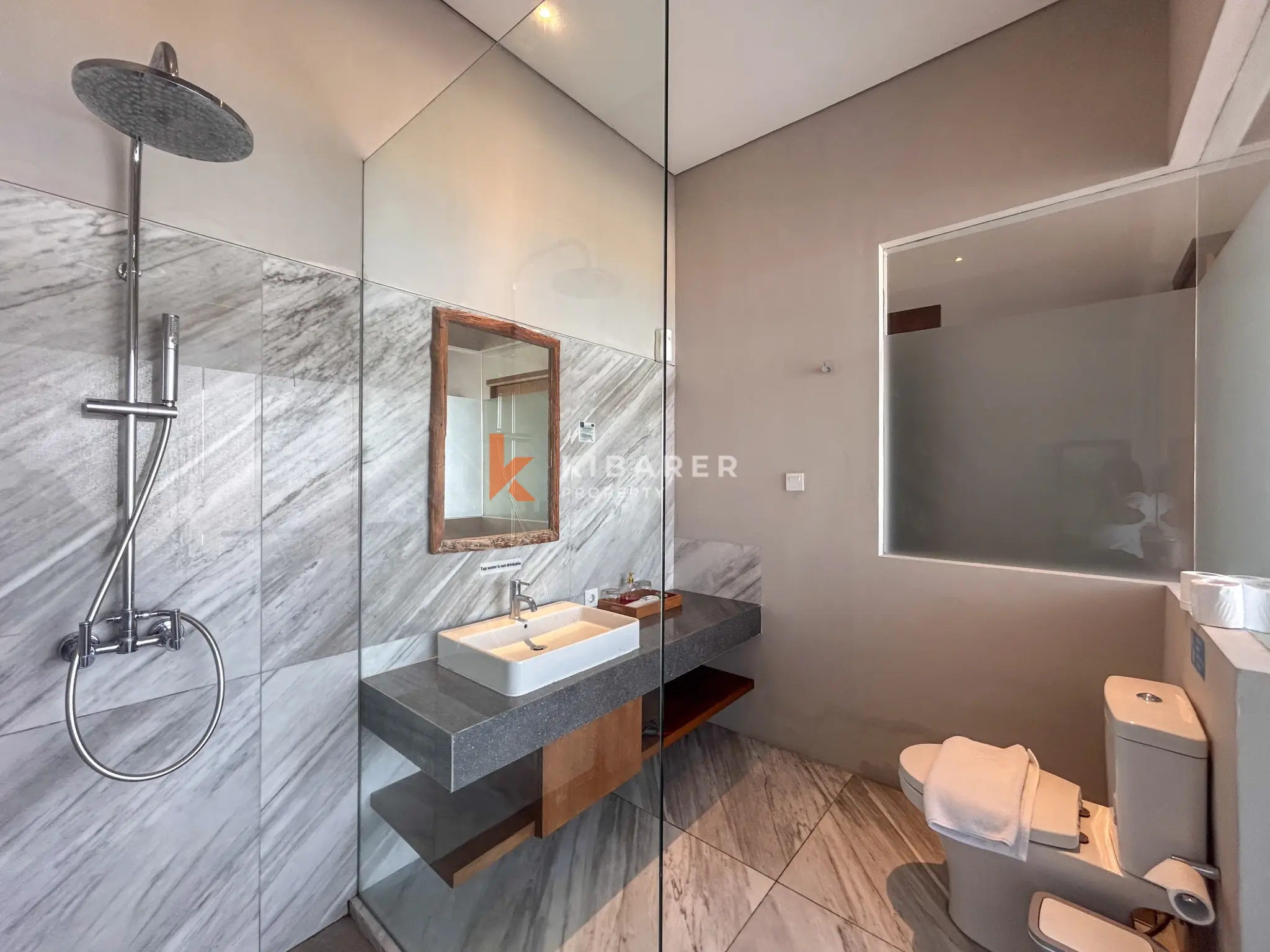 Modern Three-Bedroom Villa with Pool and Scenic Balcony Views in Nusa Dua