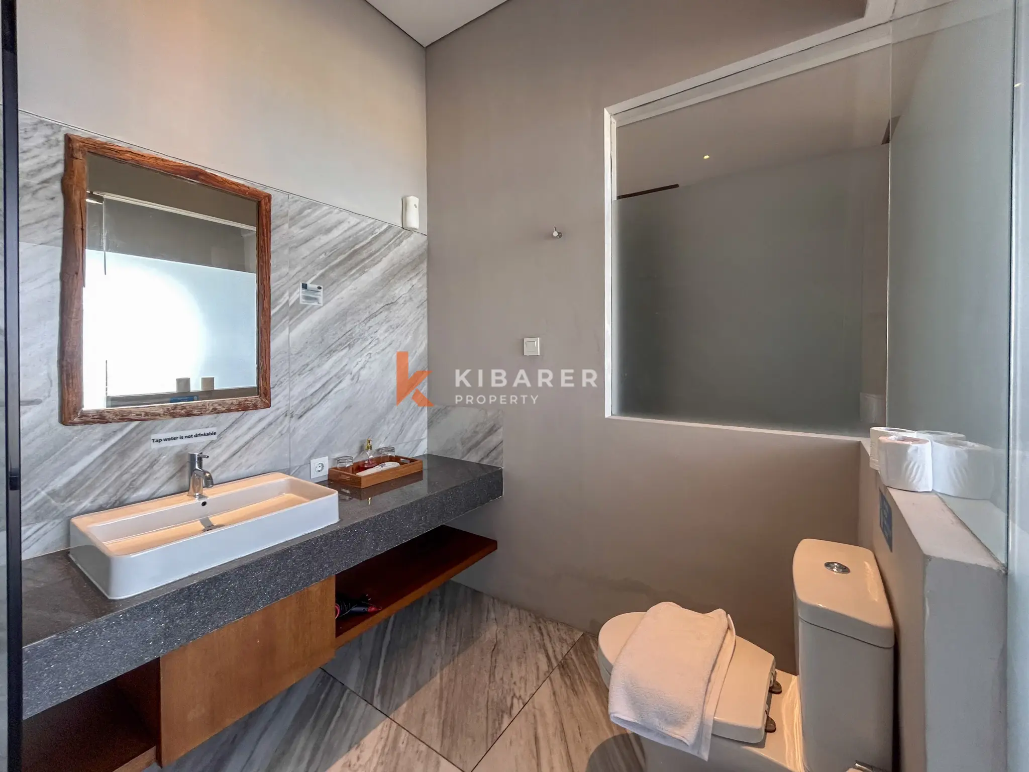 Modern Three-Bedroom Villa with Pool and Scenic Balcony Views in Nusa Dua