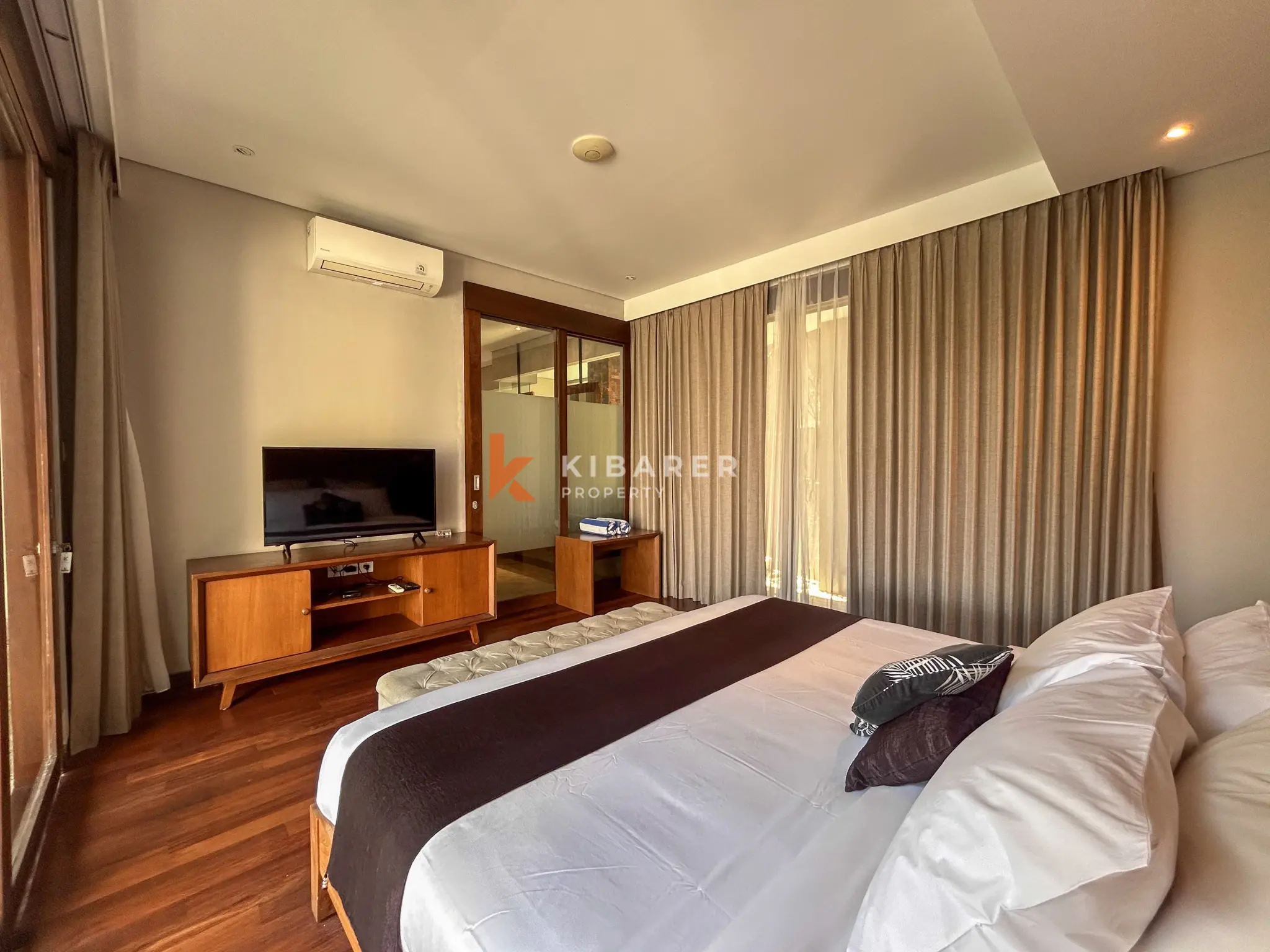 Modern Three-Bedroom Villa with Pool and Scenic Balcony Views in Nusa Dua