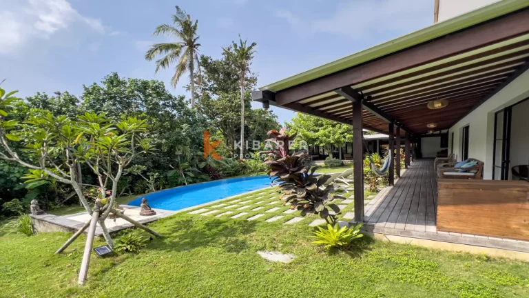 Kedungu Oasis: Elegant Four-Bedroom Villa with Enclosed Living, Pool & Lush Garden