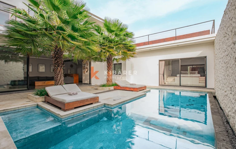 Stylish Four-Bedroom Villa with Rooftop Rice Field Views Close to Berawa