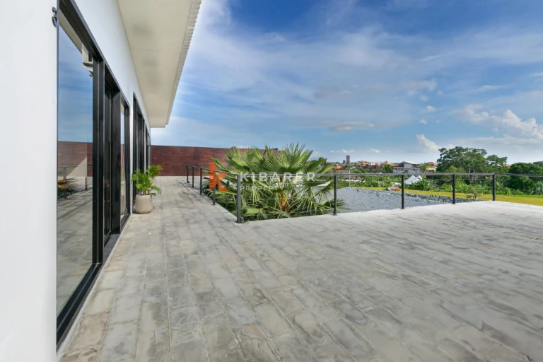 Stylish Four-Bedroom Villa with Rooftop Rice Field Views Close to Berawa