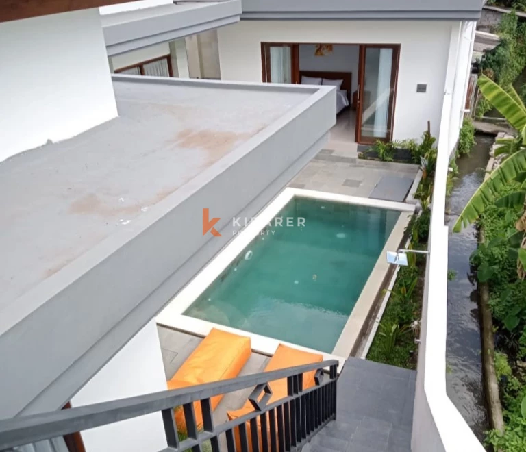 Charming Two-Bedroom Villa with Enclosed Living Room and Pool in Padonan