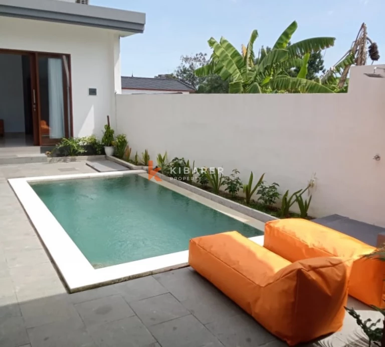 Charming Two-Bedroom Villa with Enclosed Living Room and Pool in Padonan