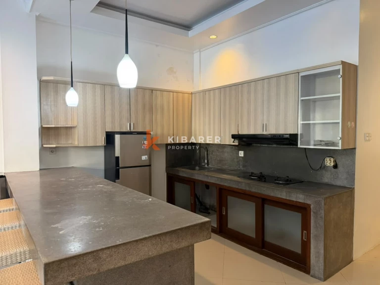 Villa traditionnelle de trois chambres au charme intemporel à Seminyak