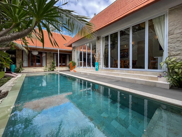 Elegant Four-Bedroom Tropical Pool Villa with Enclosed Living Spaces in Umalas