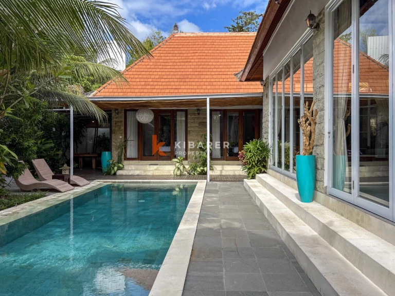 Elegant Four-Bedroom Tropical Pool Villa with Enclosed Living Spaces in Umalas