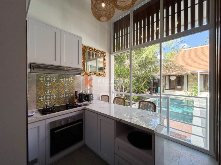 Elegant Four-Bedroom Tropical Pool Villa with Enclosed Living Spaces in Umalas