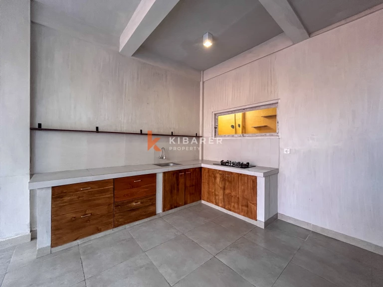 Comfortable Three-Bedroom Unfurnished Family Villa with Open Living Space in Umalas