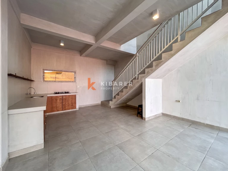 Comfortable Three-Bedroom Unfurnished Family Villa with Open Living Space in Umalas