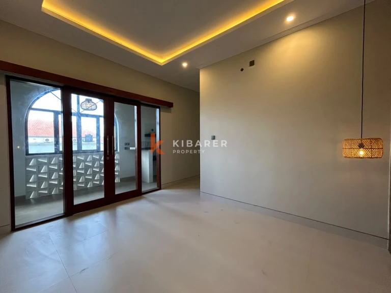 Spacious Four-Bedroom Two-Story Unfurnished Shared Pool Villa in Canggu