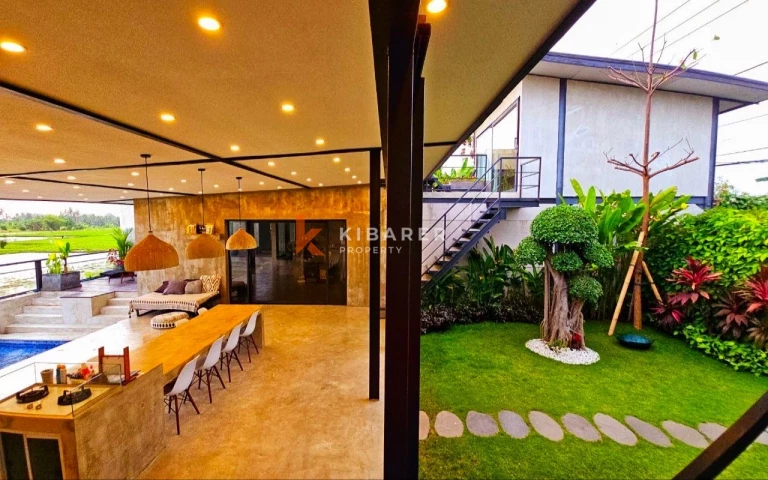 Spacious Six-Bedroom (four bedroom in main building plus two loft appartment) Villa with Ocean & Rice Field Views in Kedungu