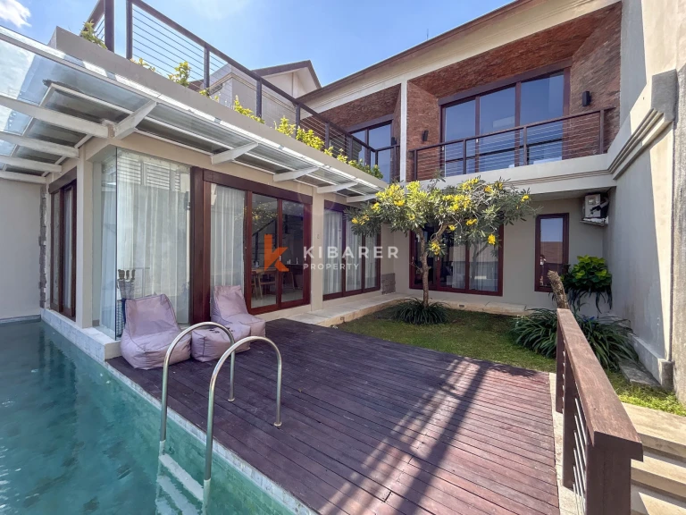 Modern Three-Bedroom Villa with Pool and Scenic Balcony Views in Nusa Dua