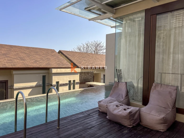 Modern Three-Bedroom Villa with Pool and Scenic Balcony Views in Nusa Dua
