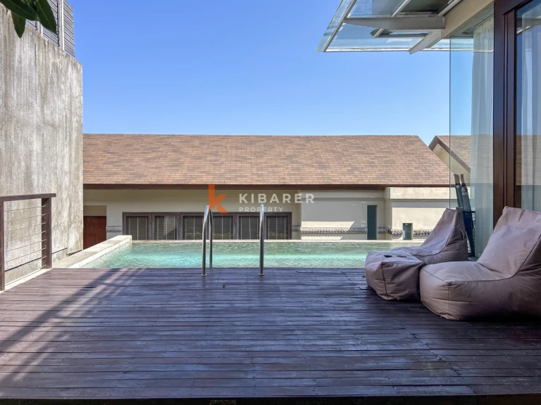 Modern Three-Bedroom Villa with Pool and Scenic Balcony Views in Nusa Dua
