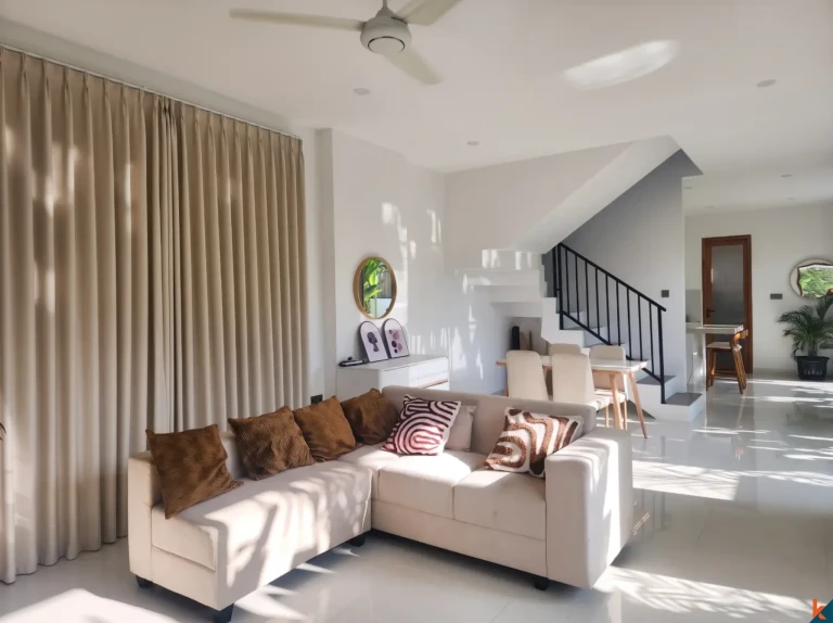 Contemporary living area with homey furniture in Mengwi house